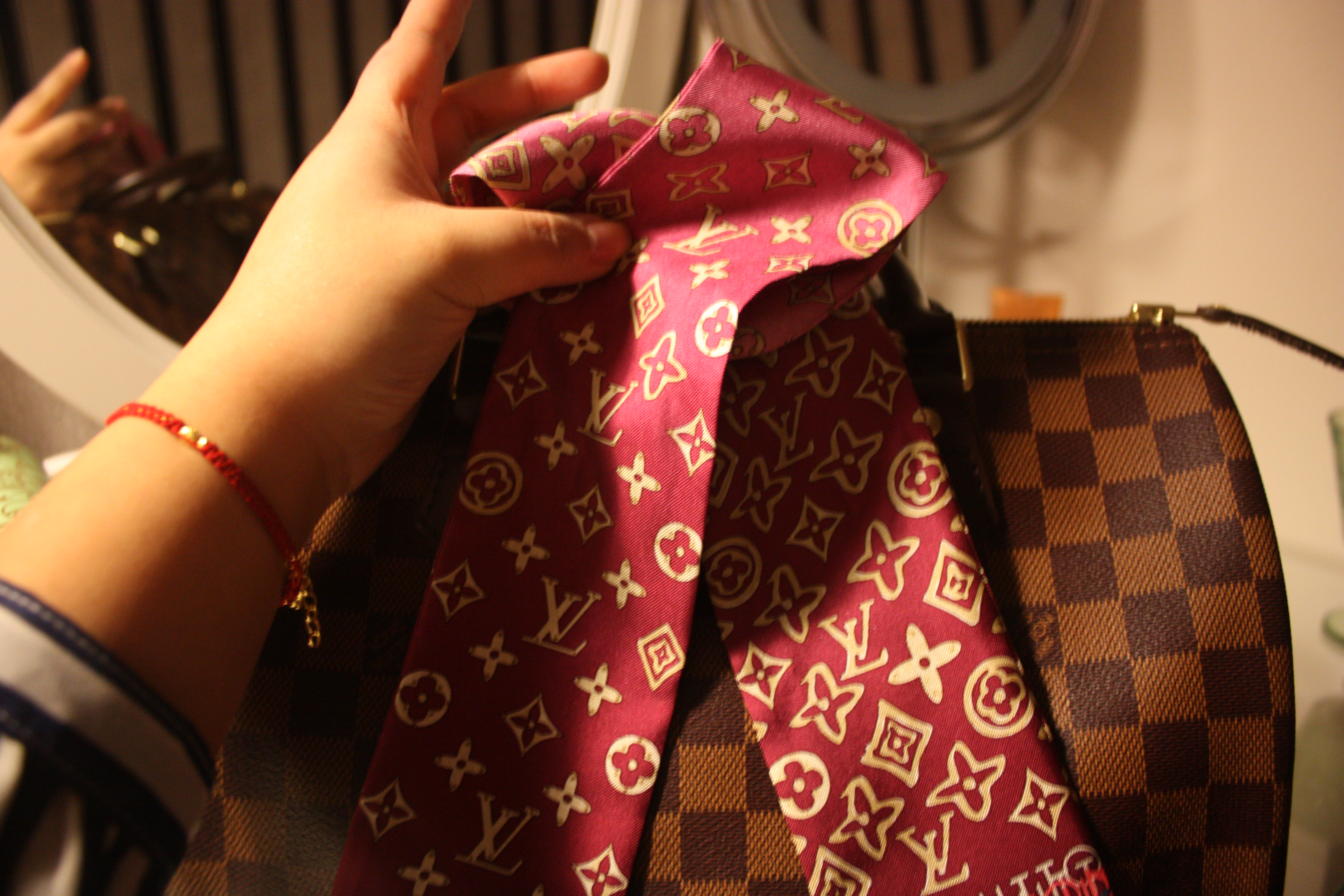 1 way to use a bag scarf. Isn't it lovely? #bagscarf #xaricollections